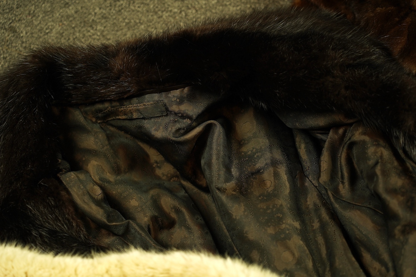 A musquash fur full length coat, a musquash fur three quarter length coat and a mink fur bolero, all approx. size 12